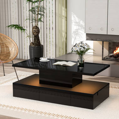 Karah coffee table with outlet storage wrought studio